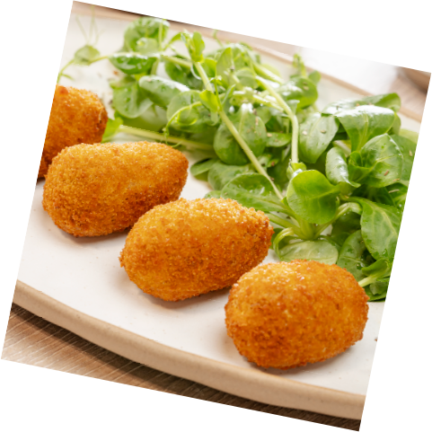 Croquetas de queso de cabra con cebolla caramelizada